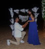 The Beach Marriage Proposal  with marry me neon sign board